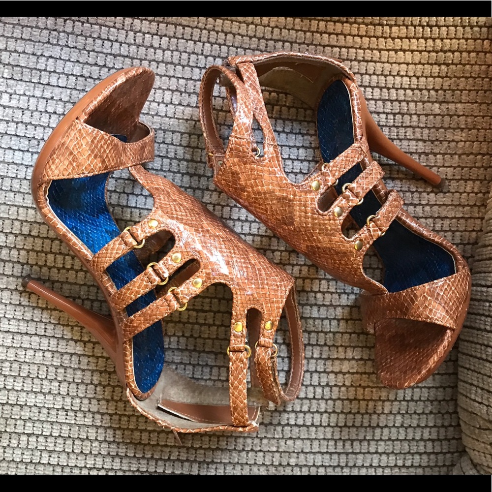 Michael Antonio brown snake print strapy shoe.